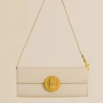 Royale Gold Emblem Clutch Purse